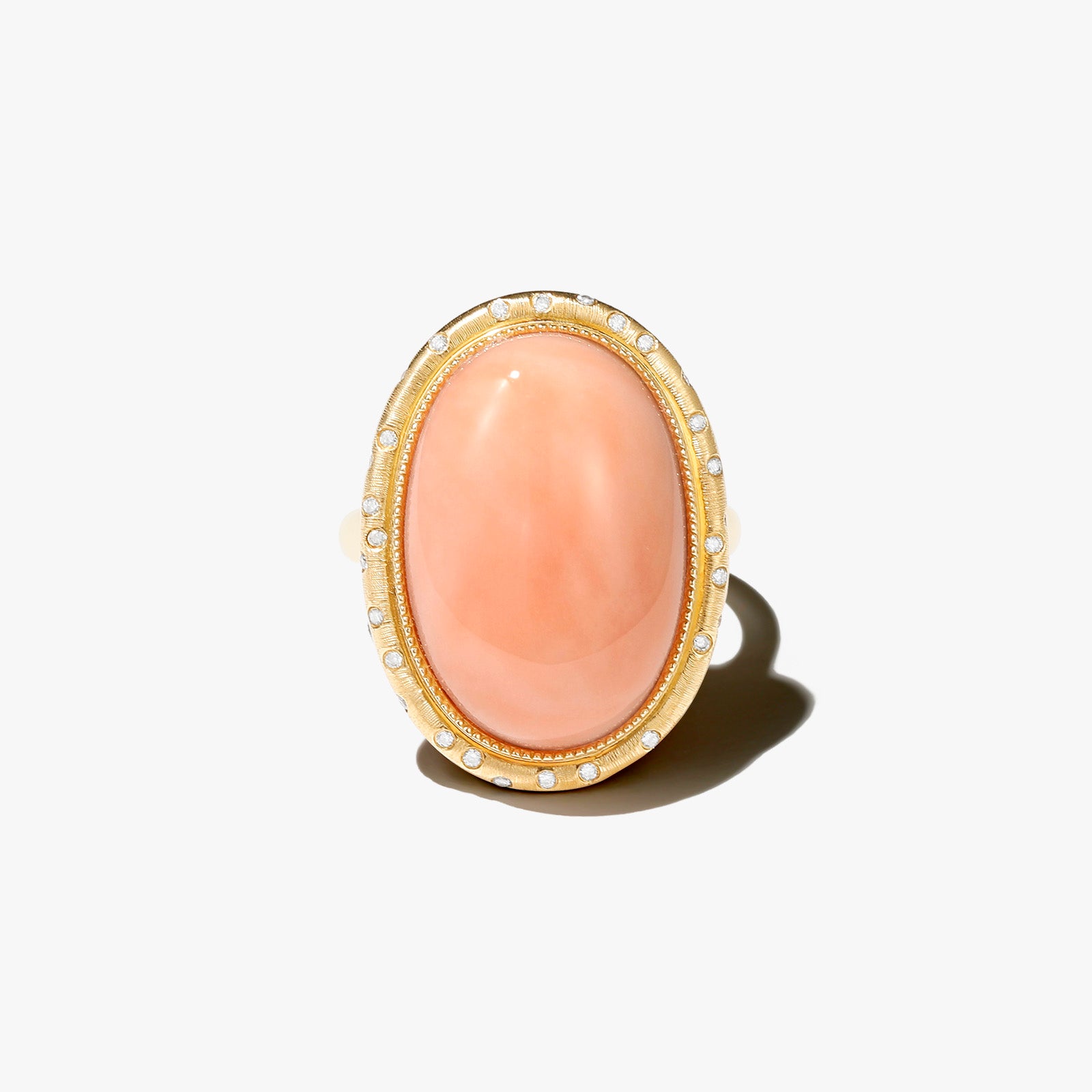 14k yellow gold with diamond pink coral ring