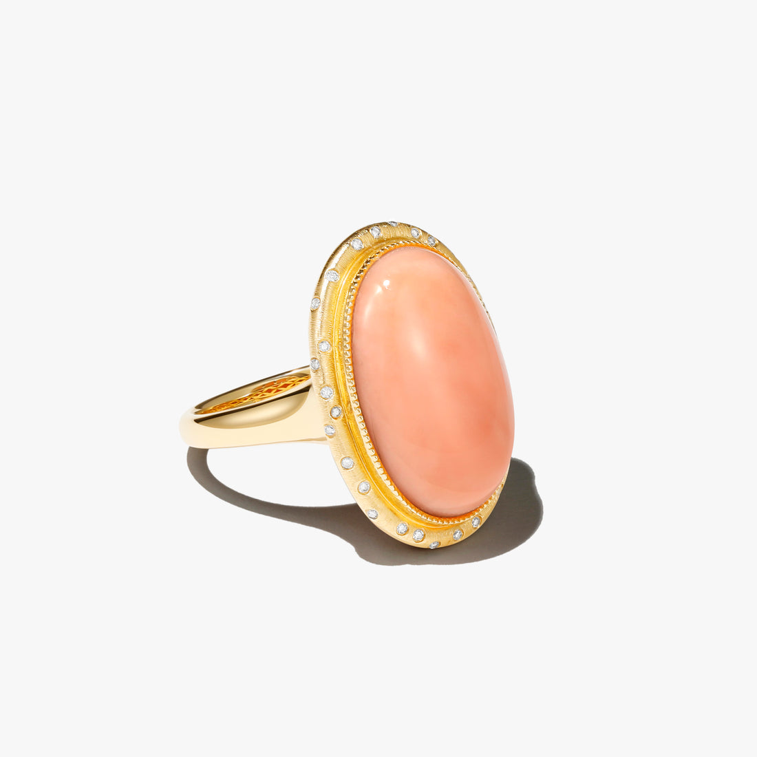 14k yellow gold with diamond pink coral ring